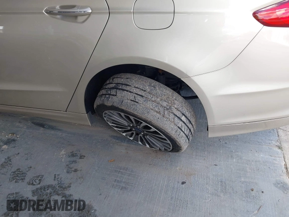 2018 Ford Fusion Titanium с VIN 3FA6P0D98JR268784, выставлен на аукционе IAAI как лот 42257897 с пробегом 145 446 миль миль и . История ставок и продаж доступна на DreamBid. Изображение 6.