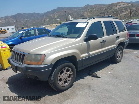 2001 Jeep Grand Cherokee Laredo with VIN 1J4GX48S01C606559, listed as a IAAI auction lot 42384286 with 149,146 mi miles and . Bid and sale history available at DreamBid. Image 2.