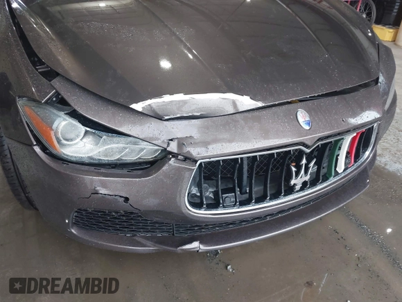 2015 Maserati Ghibli S Q4 with VIN ZAM57RTA3F1146241, listed as a IAAI auction lot 42251953 with 133,411 mi miles and . Bid and sale history available at DreamBid. Image 6.