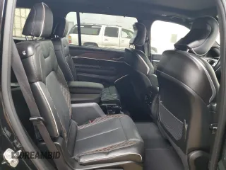 2023 Jeep Grand Cherokee Summit Reserve with VIN 1C4RJKEG3P8862582, listed as a Copart auction lot 54504345 with 9,763 mi miles and Salvage title. Bid and sale history available at DreamBid. Image 11.