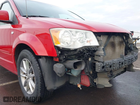 2014 Dodge Grand Caravan SXT with VIN 2C4RDGCG3ER257695, listed as a IAAI auction lot 41534568 with 116,896 mi miles and . Bid and sale history available at DreamBid. Image 19.