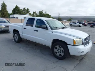 2006 Dodge Dakota SLT with VIN 1D7HE48N26S698223, listed as a IAAI auction lot 42586220 with 100,548 mi miles and . Bid and sale history available at DreamBid. Image 1.