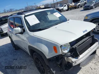 2015 Jeep Renegade Latitude with VIN ZACCJABT2FPC31041, listed as a IAAI auction lot 41626396 with 93,956 mi miles. Bid and sale history available at carsss.com. Image 1.