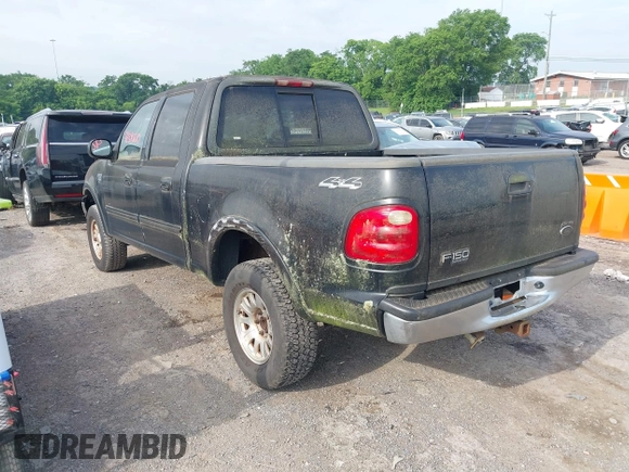 2001 Ford F-150 XLT with VIN 1FTRW08L61KD90032, listed as a IAAI auction lot 42385610 with 164,252 mi miles and . Bid and sale history available at DreamBid. Image 3.