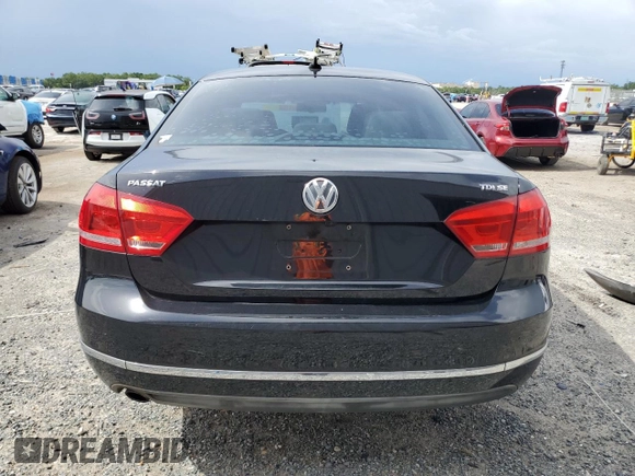 2014 Volkswagen Passat SE with VIN 1VWBN7A35EC094262, listed as a Copart auction lot 60287965 with 71,081 mi miles and Salvage title. Bid and sale history available at DreamBid. Image 6.