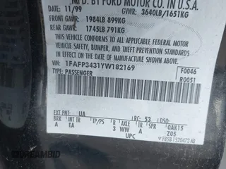 2000 Ford Focus SE with VIN 1FAFP3431YW182169, listed as a IAAI auction lot 42539335 with Not provided miles and . Bid and sale history available at DreamBid. Image 9.