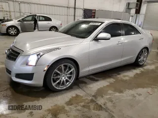 2014 Cadillac ATS Standard AWD with VIN 1G6AG5RX7E0103908, listed as a Copart auction lot 60663415 with 69,169 mi miles and Salvage title. Bid and sale history available at DreamBid. Image 1.