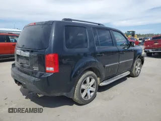 2013 Honda Pilot Touring z VIN 5FNYF4H97DB007336, wystawiony jako Copart lot #52785595 z przebiegiem 141 104 mil mil oraz Szkoda całkowita • Salvage title. Historia ofert i sprzedaży dostępna na DreamBid. Obrazek 3.