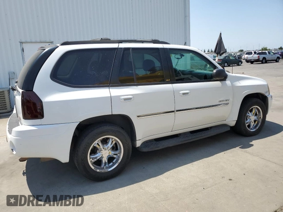 2006 GMC Envoy SLE z VIN 1GKDT13S762345183, wystawiony jako Copart lot #60096645 z przebiegiem 249 658 mil mil oraz Szkoda całkowita • Salvage title. Historia ofert i sprzedaży dostępna na DreamBid. Obrazek 3.