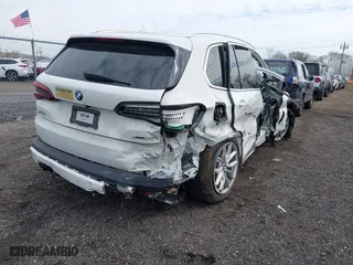 2023 BMW X5 xDrive40i with VIN 5UXCR6C00P9P33221, listed as a IAAI auction lot 41631391 with 19,023 mi miles. Bid and sale history available at carsss.com. Image 4.
