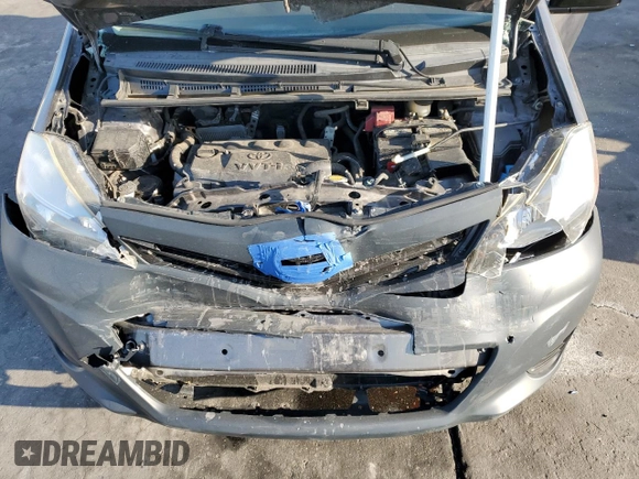 2012 Toyota Yaris L z VIN JTDKTUD33CD541021, wystawiony jako Copart lot #49515845 z przebiegiem 69 122 mil mil oraz Szkoda całkowita • Salvage title. Historia ofert i sprzedaży dostępna na DreamBid. Obrazek 12.