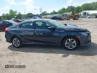 2018 Honda Civic LX with VIN 2HGFC2F53JH560402, listed as a IAAI auction lot 42152391 with 75,384 mi miles and . Bid and sale history available at DreamBid. Image 13.