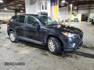 2013 Mazda CX-5 Touring with VIN JM3KE4CE8D0121607, listed as a Copart auction lot 56217965 with 143,861 mi miles and Clean Title. Bid and sale history available at DreamBid. Image 4.