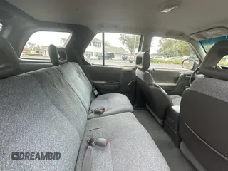 1999 Isuzu Rodeo S z VIN 4S2CK58W7X4357230, wystawiony jako Copart lot #45724855 z przebiegiem 130 446 mil mil oraz Czysty tytuł • Clean title. Historia ofert i sprzedaży dostępna na DreamBid. Obrazek 6.