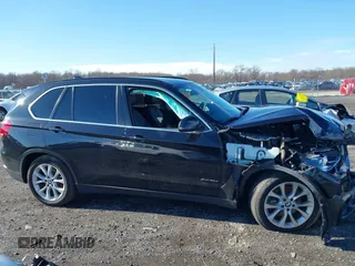 2016 BMW X5 xDrive40e z VIN 5UXKT0C54G0S78884, wystawiony jako IAAI lot #41208477 z przebiegiem 90 181 mil mil oraz . Historia ofert i sprzedaży dostępna na DreamBid. Obrazek 13.