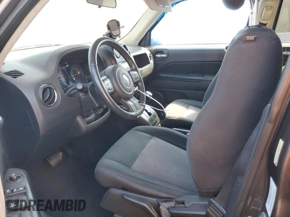 2014 Jeep Patriot Latitude with VIN 1C4NJPFB9ED822901, listed as a Copart auction lot 51005655 with 130,149 mi miles and Salvage Title. Bid and sale history available at carsss.com. Image 7.