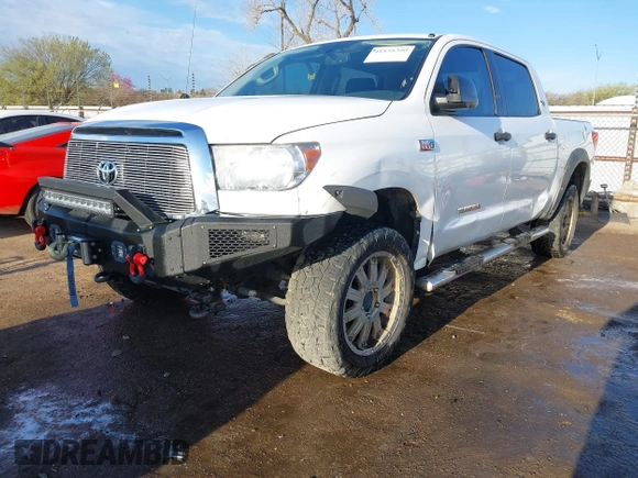 2012 Toyota Tundra 4WD Truck with VIN 5TFDW5F10CX241968, listed as a IAAI auction lot 41858300 with 272,634 mi miles. Bid and sale history available at carsss.com. Image 17.
