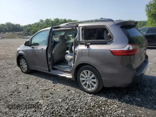 2015 Toyota Sienna LE with VIN 5TDJK3DC0FS112243, listed as a Copart auction lot 61791405 with 86,039 mi miles and Salvage title. Bid and sale history available at DreamBid. Image 2.