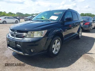 2012 Dodge Journey SXT with VIN 3C4PDCBG0CT352887, listed as a IAAI auction lot 42618786 with 201,008 mi miles and . Bid and sale history available at DreamBid. Image 2.