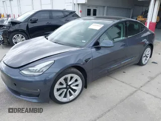 2021 Tesla Model 3 Long Range with VIN 5YJ3E1EB4MF855581, listed as a IAAI auction lot 41974515 with 71,561 mi miles. Bid and sale history available at carsss.com. Image 22.