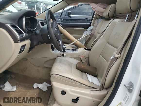 2015 Jeep Grand Cherokee Overland z VIN 1C4RJFCG8FC726437, wystawiony jako Copart lot #63671265 z przebiegiem 158 452 mil mil oraz Czysty tytuł • Clean title. Historia ofert i sprzedaży dostępna na DreamBid. Obrazek 7.