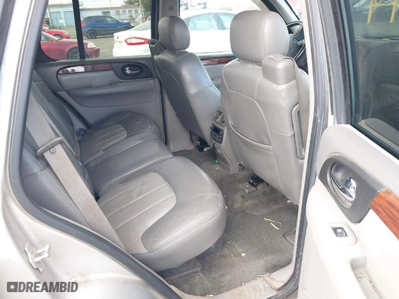 2004 GMC Envoy SLE with VIN 1GKDT13S642418153, listed as a IAAI auction lot 41660072 with 300,757 mi miles. Bid and sale history available at carsss.com. Image 8.