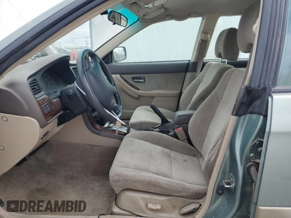 2003 Subaru Legacy Outback z VIN 4S3BH665937644454, wystawiony jako Copart lot #57404695 z przebiegiem 242 345 mil mil oraz Szkoda całkowita • Salvage title. Historia ofert i sprzedaży dostępna na DreamBid. Obrazek 7.