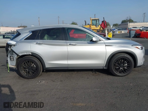 2020 Infiniti QX50 Luxe z VIN 3PCAJ5M10LF103880, wystawiony jako IAAI lot #41233450 z przebiegiem 40 247 mil mil oraz . Historia ofert i sprzedaży dostępna na DreamBid. Obrazek 13.