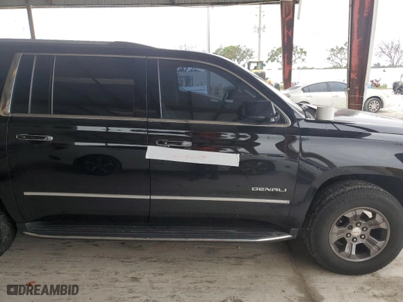 2020 GMC Yukon XL Denali with VIN 1GKS1HKJ6LR127236, listed as a Copart auction lot 51928885 with 143,579 mi miles and Salvage Title. Bid and sale history available at carsss.com. Image 13.