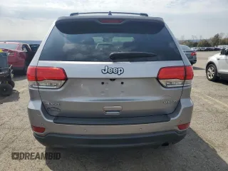 2018 Jeep Grand Cherokee Laredo E with VIN 1C4RJFAG0JC351090, listed as a Copart auction lot 52958635 with 96,956 mi miles and Salvage Title. Bid and sale history available at DreamBid. Image 6.