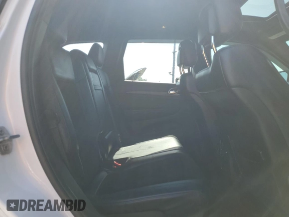 2018 Jeep Grand Cherokee Laredo with VIN 1C4RJFAG2JC117744, listed as a Copart auction lot 60881105 with 109,601 mi miles and Salvage title. Bid and sale history available at DreamBid. Image 11.