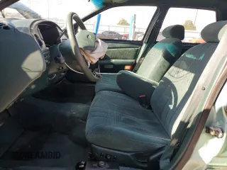 1995 Ford Taurus GL z VIN 1FALP5242SG181625, wystawiony jako Copart lot #81184774 z przebiegiem 107 385 mil mil oraz Szkoda całkowita • Salvage title. Historia ofert i sprzedaży dostępna na DreamBid. Obrazek 7.