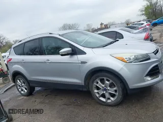 2015 Ford Escape Titanium with VIN 1FMCU9JX2FUA24279, listed as a IAAI auction lot 41930868 with 254,997 mi miles. Bid and sale history available at carsss.com. Image 14.