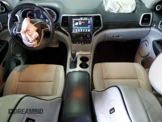 2018 Jeep Grand Cherokee Summit with VIN 1C4RJFJT5JC273869, listed as a Copart auction lot 57482865 with 70,843 mi miles and Salvage title. Bid and sale history available at DreamBid. Image 8.
