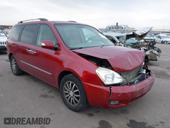 2012 Kia Sedona EX with VIN KNDMH4C76C6463143, listed as a IAAI auction lot 41990970 with 214,045 mi miles. Bid and sale history available at carsss.com. Image 1.