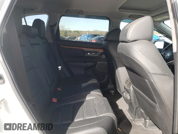 2020 Honda CR-V Touring z VIN 7FART6H9XLE009139, wystawiony jako Copart lot #44428825 z przebiegiem 47 152 mil mil oraz Szkoda całkowita • Salvage title. Historia ofert i sprzedaży dostępna na DreamBid. Obrazek 11.
