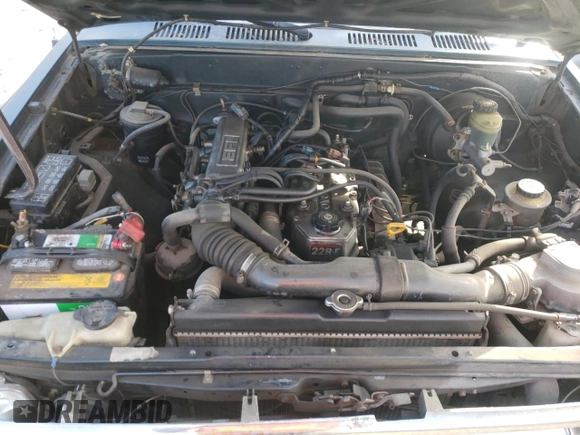 1994 Toyota Pickup DLX z VIN 4TARN81P4RZ254673, wystawiony jako Copart lot #41384465 z przebiegiem 181 534 mil mil oraz Szkoda całkowita • Salvage title. Historia ofert i sprzedaży dostępna na DreamBid. Obrazek 11.