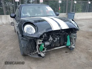 2015 MINI Hardtop 4 Door with VIN WMWXS5C58FT833420, listed as a IAAI auction lot 42560244 with 115,446 mi miles and . Bid and sale history available at DreamBid. Image 6.