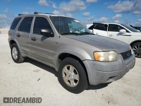 2001 Ford Escape XLT with VIN 1FMCU04101KF61126, listed as a Copart auction lot 76174744 with 0 mi miles and Salvage Title. Bid and sale history available at carsss.com. Image 4.