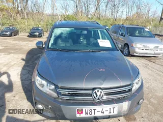 2012 Volkswagen Tiguan SEL with VIN WVGAV7AX2CW000962, listed as a IAAI auction lot 40815475 with 162,859 mi miles and . Bid and sale history available at DreamBid. Image 6.