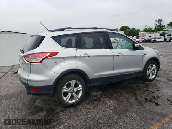 2013 Ford Escape SE with VIN 1FMCU0GX7DUB00465, listed as a Copart auction lot 58265705 with 227,613 mi miles and Salvage title. Bid and sale history available at DreamBid. Image 3.