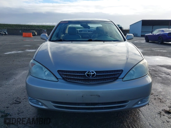 2004 Toyota Camry LE with VIN 4T1BF30K24U577908, listed as a IAAI auction lot 41591147 with 151,678 mi miles and . Bid and sale history available at DreamBid. Image 13.