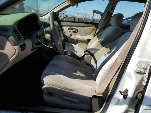 1998 Oldsmobile Intrigue GL z VIN 1G3WS52K2WF325982, wystawiony jako Copart lot #77172634 z przebiegiem 141 276 mil mil oraz Szkody całkowita. Historia ofert i sprzedaży dostępna na DreamBid. Obrazek 7.