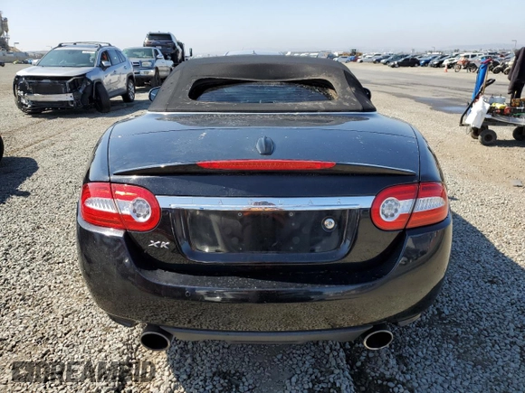 2010 Jaguar XK with VIN SAJWA4GB5ALB36022, listed as a Copart auction lot 56038565 with 101,988 mi miles and Clean Title. Bid and sale history available at DreamBid. Image 6.