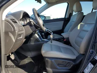 2014 Mazda CX-5 Grand Touring with VIN JM3KE4DY1E0405493, listed as a Copart auction lot 41688915 with 94,970 mi miles and Salvage Title. Bid and sale history available at carsss.com. Image 7.