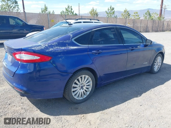 2014 Ford Fusion SE Hybrid with VIN 3FA6P0LUXER220053, listed as a IAAI auction lot 42229079 with 187,199 mi miles and . Bid and sale history available at DreamBid. Image 4.