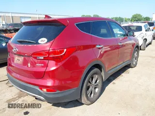 2014 Hyundai Santa Fe with VIN 5XYZT3LB1EG134837, listed as a IAAI auction lot 42454126 with 118,225 mi miles and . Bid and sale history available at DreamBid. Image 4.