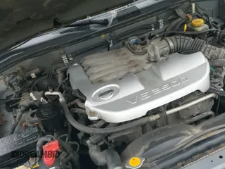 2004 Nissan Pathfinder SE z VIN JN8DR09Y54W905616, wystawiony jako IAAI lot #42441301 z przebiegiem 168 124 mil mil oraz . Historia ofert i sprzedaży dostępna na DreamBid. Obrazek 13.