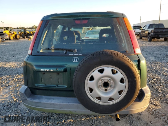 2000 Honda CR-V LX with VIN JHLRD1848YC038520, listed as a Copart auction lot 74137634 with 104,332 mi miles and Salvage Title. Bid and sale history available at carsss.com. Image 6.