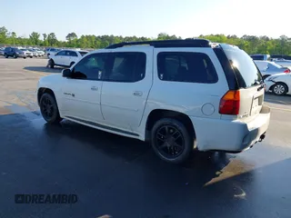 2006 GMC Envoy XL Denali with VIN 1GKES66M566159202, listed as a IAAI auction lot 41988276 with 293,983 mi miles. Bid and sale history available at carsss.com. Image 3.